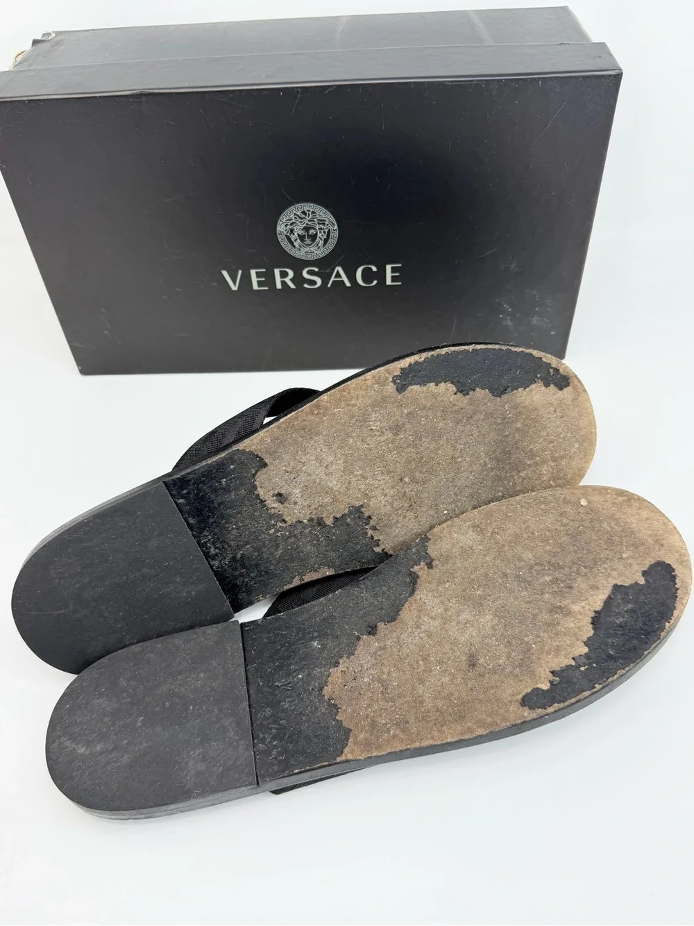 Versace Black Thong Sandals with Gold Medusa Accent